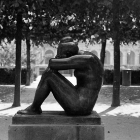 Lonely statue in a garden at the Louvre